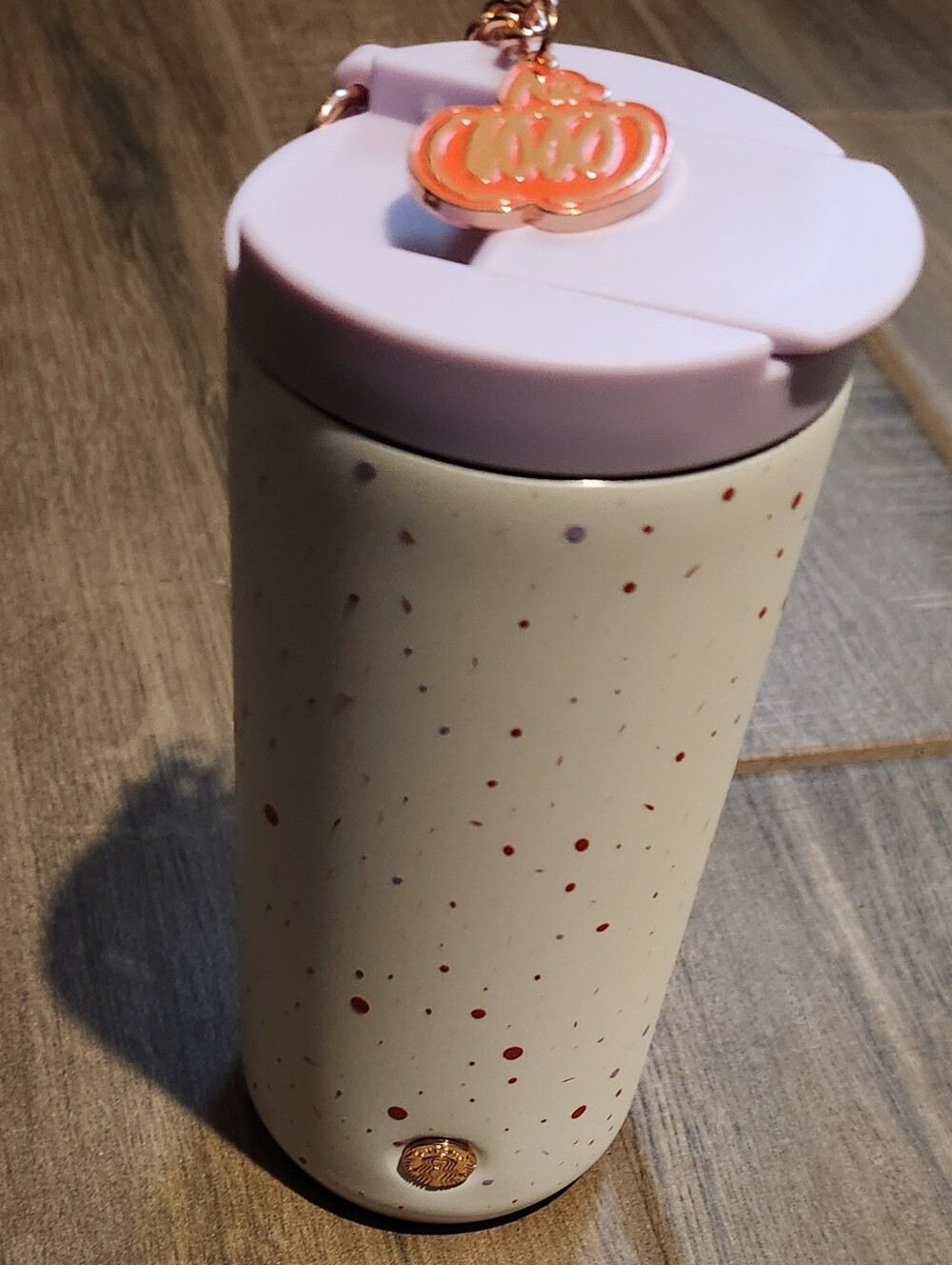 Starbucks cream speckled travel tumbler with Lavender lid and gold charm